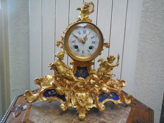 Часы из бронзы и фарфора Chariot